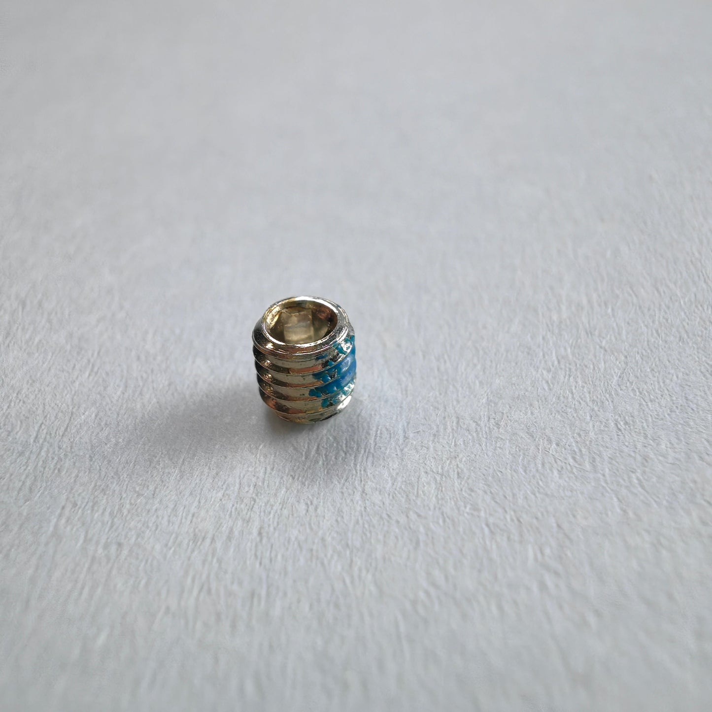 J100 Spreader Set Screw